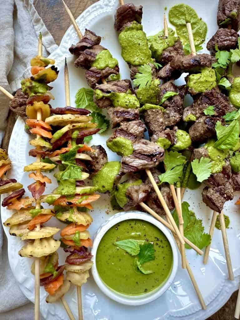Grilled Steak & Rainbow Carrot Kabobs with Spicy Green Sauce